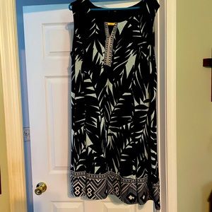 Very cute blue print dress. Size 22. Above knee length. Very good condition.